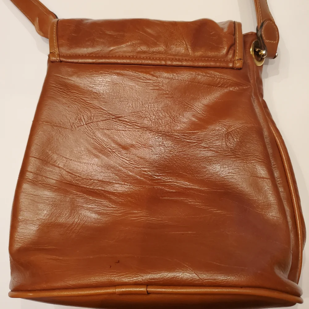 Vintage Capezio Cognac Bucket Crossbody Bag – Classic Gold Medallion